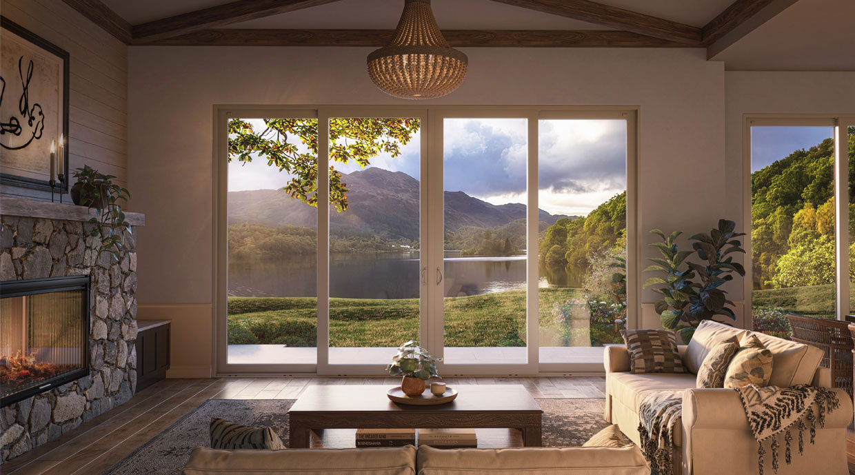 Living room with a Ply Gem Perspective Patio Door and mountain views.