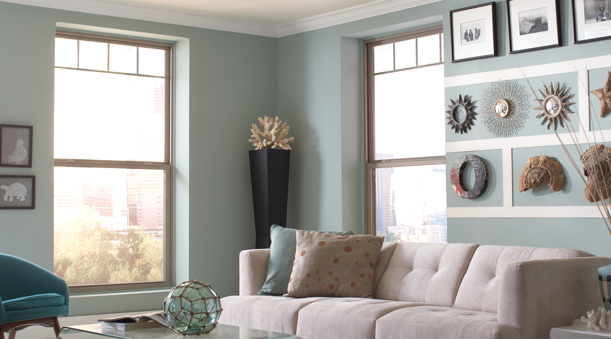 Living room with Ply Gem single hung windows with plaza grilles.