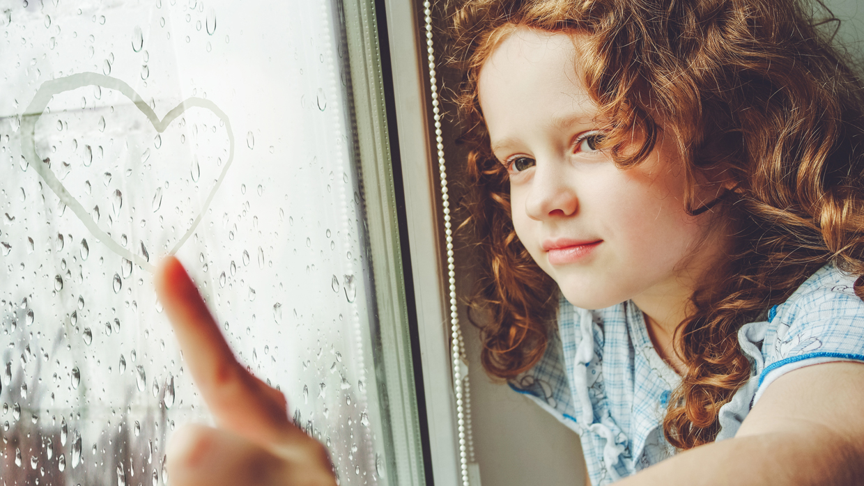 Window Safety Week – Girl drawing on the window