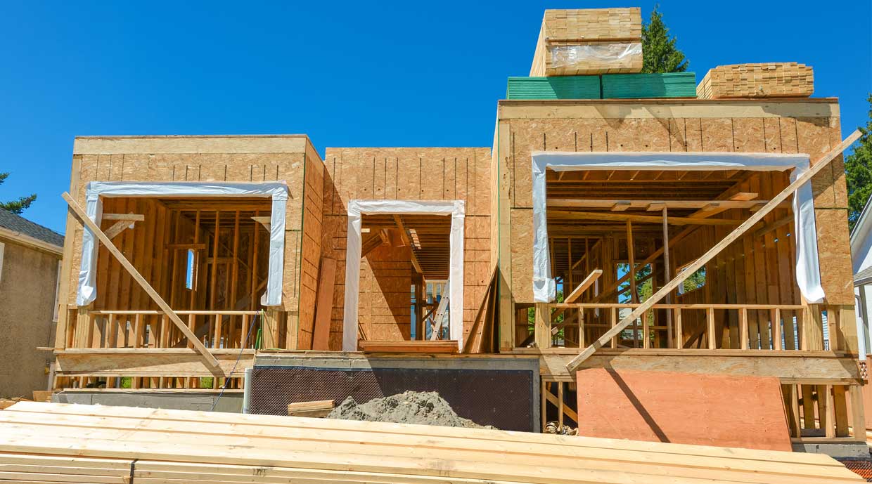 Oversized Windows — Structural Impacts Builders Need to Plan For 3 New home construction site window and door openings.